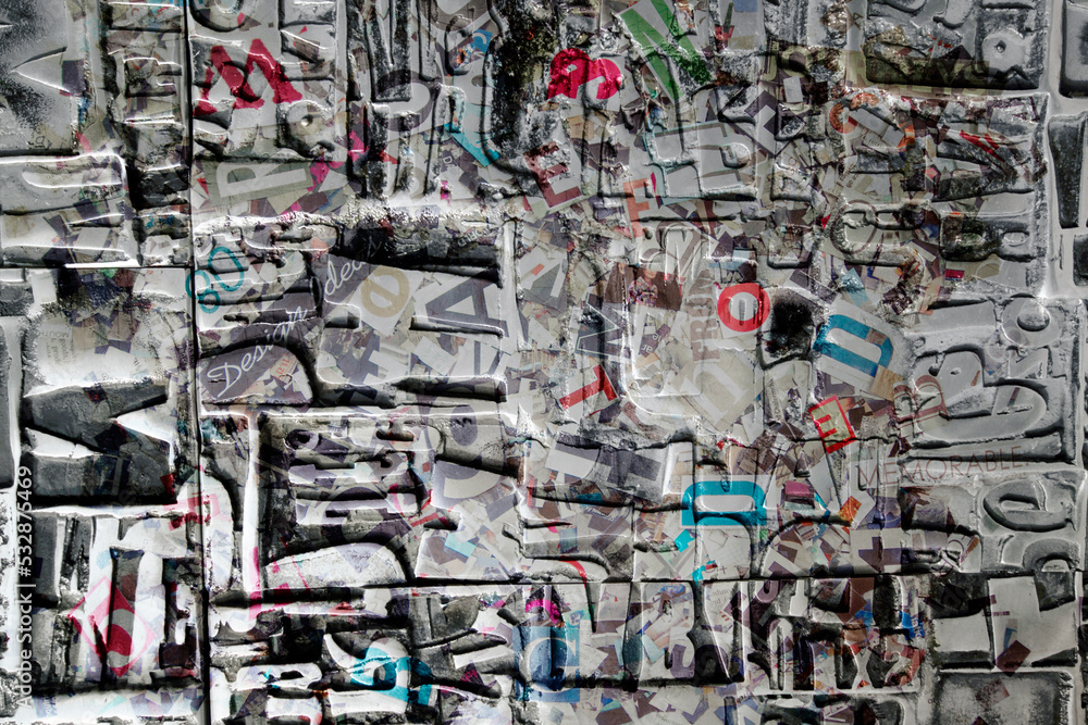 Fototapeta premium abstract metal texture with letters and words 