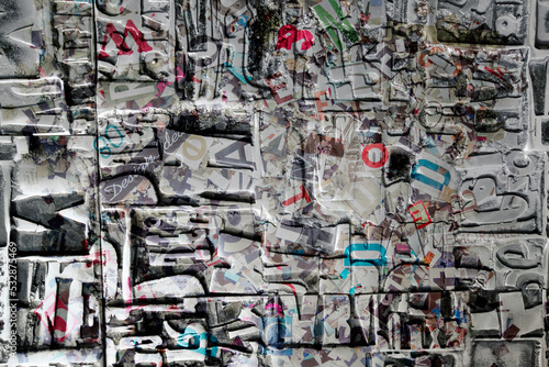 Wallpaper Mural abstract metal texture with letters and words  Torontodigital.ca