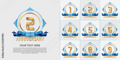 set of anniversary with golden color and blue ribbon can be use for celebration moment