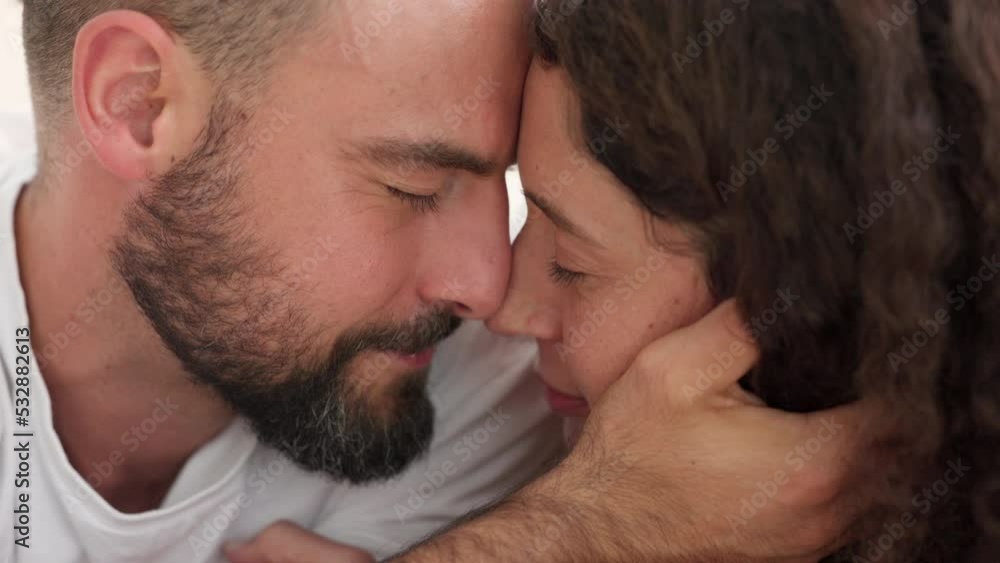 Couple hug, love smile and happy together in the bedroom of house, face embrace in marriage and touch with care in bed of home. Man and woman hugging in happiness in relationship in apartment Couple hug, love smile and happy together in the bedroom of house, face embrace in marriage and touch with care in bed of home. Man and woman hugging in happiness in relationship in apartment