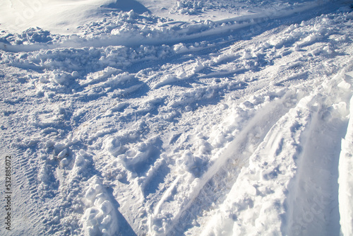 Road in the snow in winter as a background. © schankz