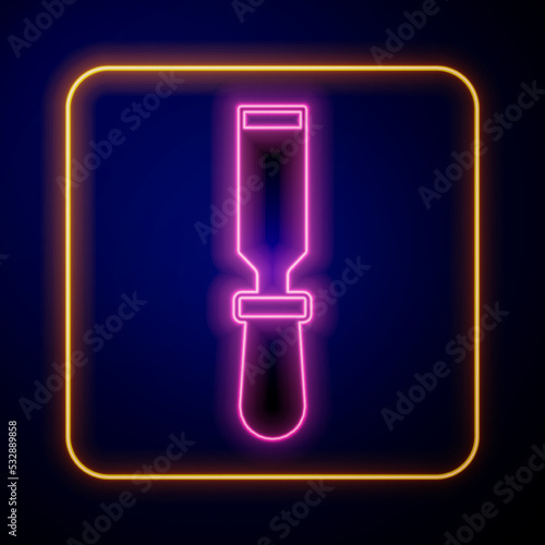 Glowing neon Chisel tool for wood icon isolated on black background. Vector