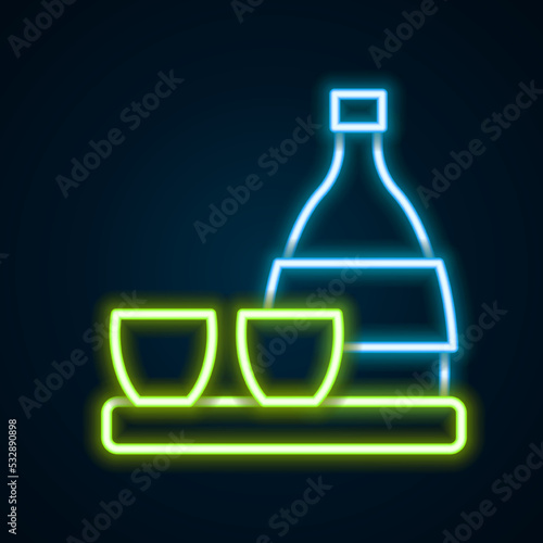Glowing neon line Bottle of sake, small cup of sake icon isolated on black background. Colorful outline concept. Vector