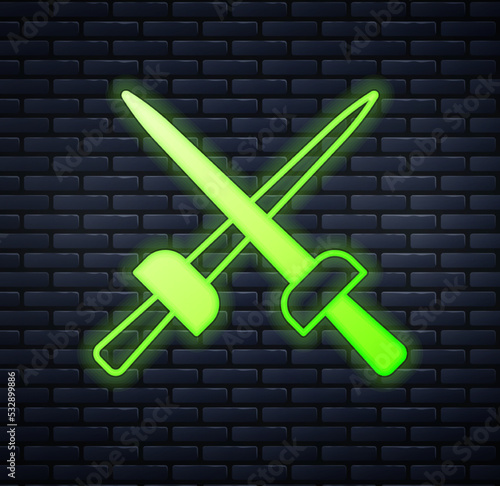 Glowing neon Fencing icon isolated on brick wall background. Sport equipment. Vector