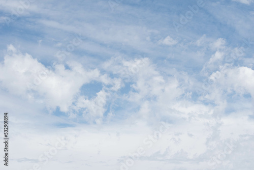 nubes blancas de diversas formas con cielo azul photo