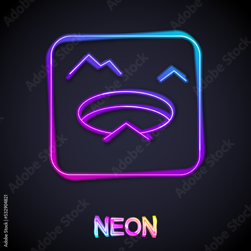 Glowing neon line Winter fishing icon isolated on black background. Round ice frame. Hole in ice. Vector