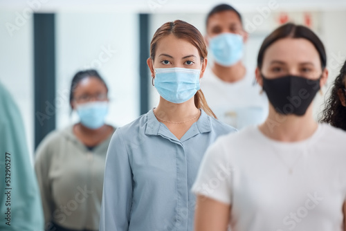 Compliance, workers and covid rules in an office with colleagues social distancing and standing in unity. Trust, management and safety by ambitious employee working through a pandemic together
