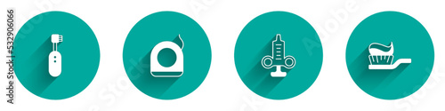 Set Electric toothbrush, Dental floss, Syringe and Toothbrush with toothpaste icon with long shadow. Vector