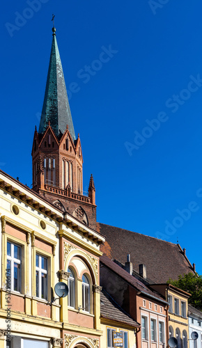Panorama of Rynek main market square with Holy Mary gothic church in old town quarter of Trzebiatow in Poland © Art Media Factory