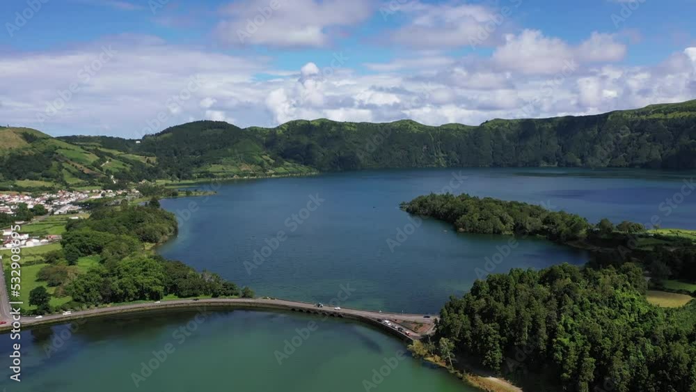 The colorful landscape of the island of San Miguel. Aerial view of the Azores. Lakes in Sete Cidades volcanic craters on San Miguel island, Azores, Portugal. The colorful landscape of the island of San Miguel. Aerial view of the Azores. Lakes in Sete Cidades volcanic craters on San Miguel island, Azores, Portugal.