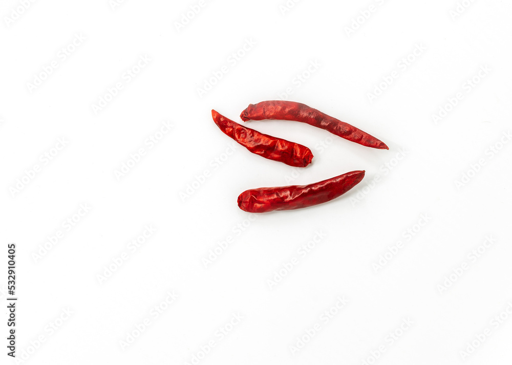 Isolated dried chili on white background, top view image of dried chili. Isolated dried chili on white background, top view image of dried chili.