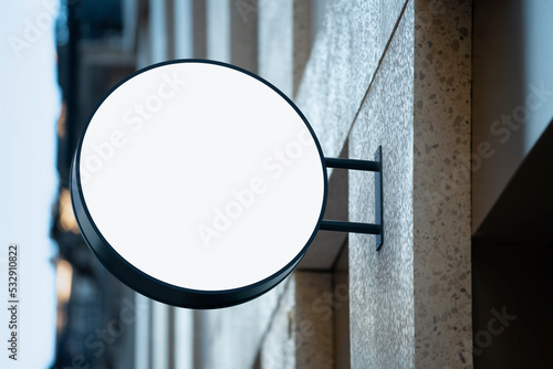 Hanging signage on the wall. Light box template for the logo photo