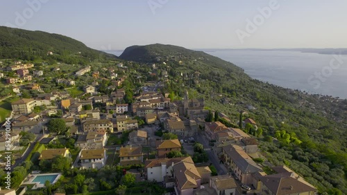 City located on the shores of Lake Garda, Italy. Filming from the drone during the summer. Malcesine, Garda, Lasize, Desenzano, Pesciera, Limone sul Garda. photo