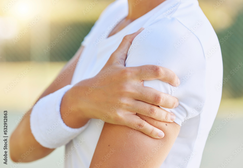 Sports, muscle pain or injury of tennis player woman during fitness, outdoor training or exercise with sunlight bokeh. Athlete person with hand on arm for medical insurance or healthcare emergency Sports, muscle pain or injury of tennis player woman during fitness, outdoor training or exercise with sunlight bokeh. Athlete person with hand on arm for medical insurance or healthcare emergency