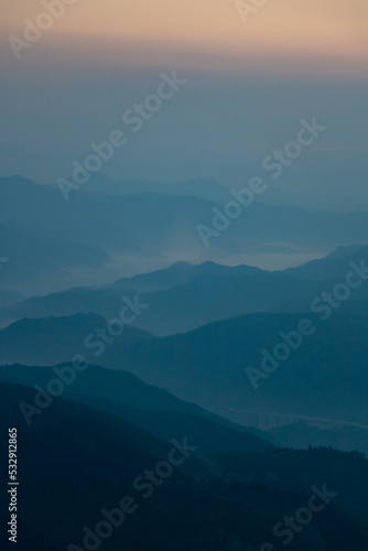 Mountains in the morning fog. © may