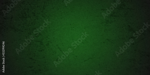 Backdrop vintage green stone grunge concrete cement blackboard chalkboard wall floor texture. Black anthracite dark green grunge old texture panorama backdrop background.