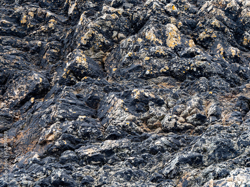 Beautiful rock deposits as a background. Stone layers close-up.