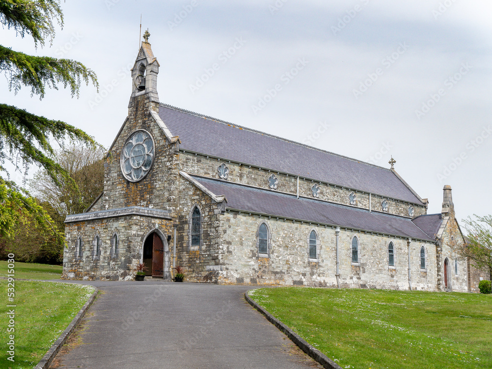 An church in Ireland. Cloudy weather and sky. Sacred Heart Roman Catholic Church, built in 1897. An church in Ireland. Cloudy weather and sky. Sacred Heart Roman Catholic Church, built in 1897.