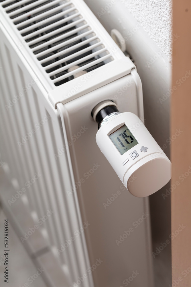 Woman's hand adjusting temperature. Woman's hand adjusting temperature.