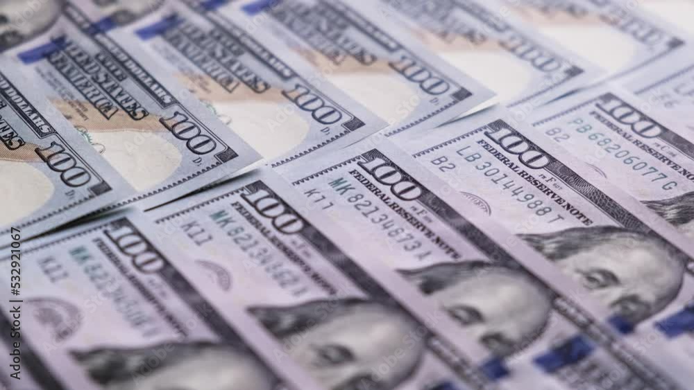 100 american dollar bills. Calculation of 100 american bill banknotes. Pile of american dollars. New hundred dollar bills. Inflation and deflation concept. Money making machine. Close-up in 4K, UHD 100 american dollar bills. Calculation of 100 american bill banknotes. Pile of american dollars. New hundred dollar bills. Inflation and deflation concept. Money making machine. Close-up in 4K, UHD