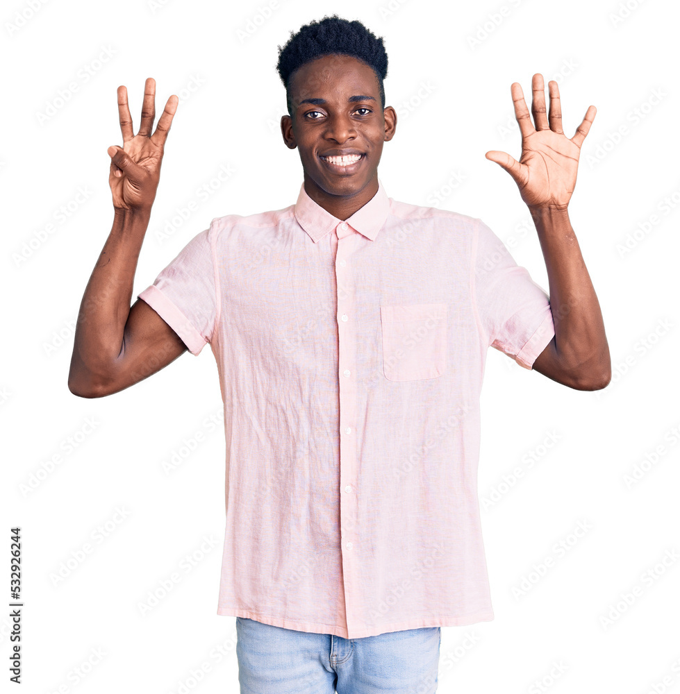 Young african american man wearing casual clothes showing and pointing up with fingers number eight while smiling confident and happy. Young african american man wearing casual clothes showing and pointing up with fingers number eight while smiling confident and happy.