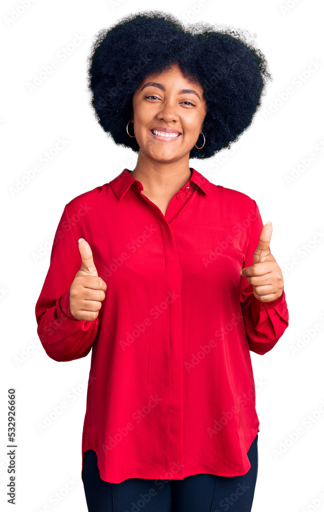 Young african american girl wearing casual clothes success sign doing positive gesture with hand, thumbs up smiling and happy. cheerful expression and winner gesture. Young african american girl wearing casual clothes success sign doing positive gesture with hand, thumbs up smiling and happy. cheerful expression and winner gesture.