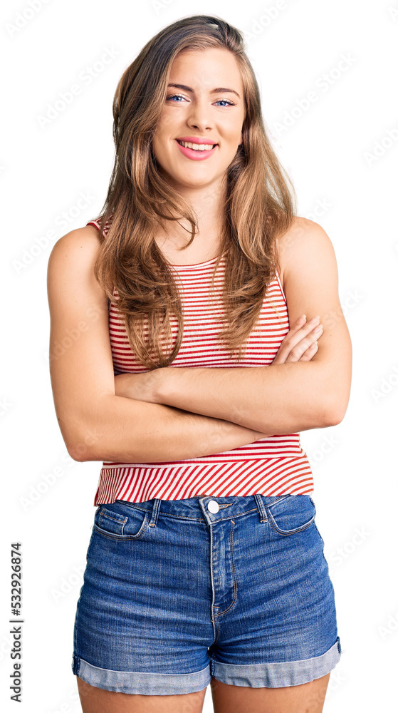 Beautiful caucasian young woman wearing casual clothes happy face smiling with crossed arms looking at the camera. positive person. Beautiful caucasian young woman wearing casual clothes happy face smiling with crossed arms looking at the camera. positive person.