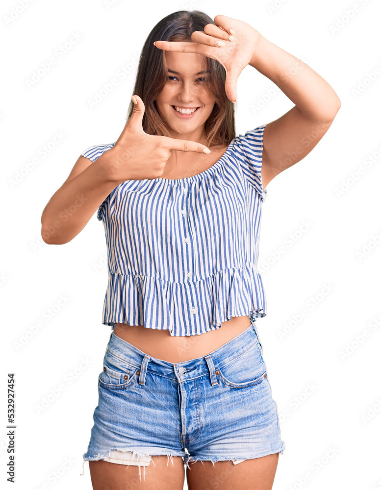 Beautiful caucasian woman wearing casual clothes smiling making frame with hands and fingers with happy face. creativity and photography concept. Beautiful caucasian woman wearing casual clothes smiling making frame with hands and fingers with happy face. creativity and photography concept.