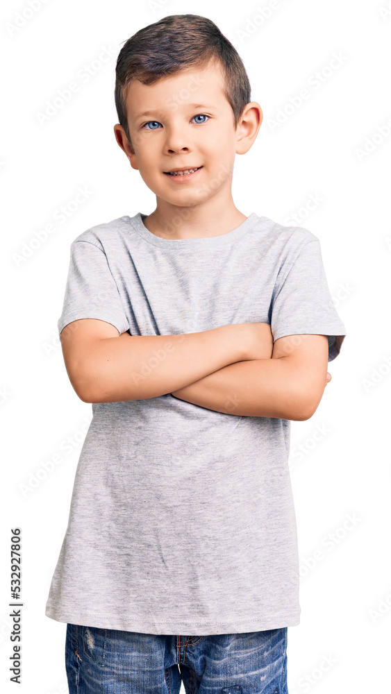 Cute blond kid wearing casual clothes happy face smiling with crossed arms looking at the camera. positive person. Cute blond kid wearing casual clothes happy face smiling with crossed arms looking at the camera. positive person.