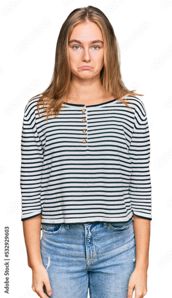 Fototapeta premium Beautiful blonde woman wearing casual clothes depressed and worry for distress, crying angry and afraid. sad expression.