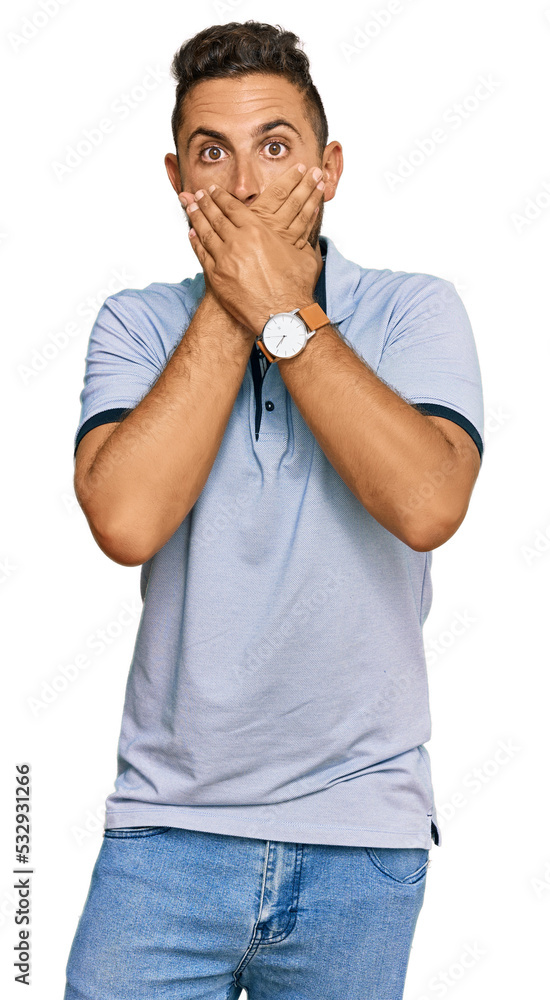 Handsome man with beard wearing casual clothes shocked covering mouth with hands for mistake. secret concept. Handsome man with beard wearing casual clothes shocked covering mouth with hands for mistake. secret concept.