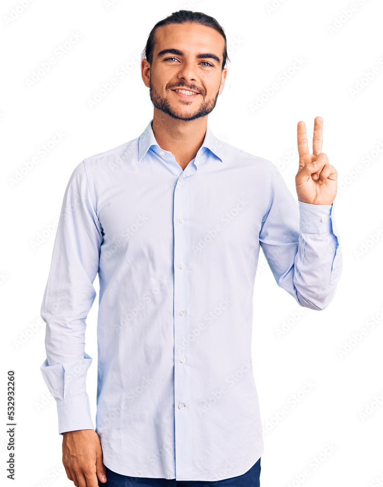 Young handsome man wearing business clothes showing and pointing up with fingers number two while smiling confident and happy. Young handsome man wearing business clothes showing and pointing up with fingers number two while smiling confident and happy.