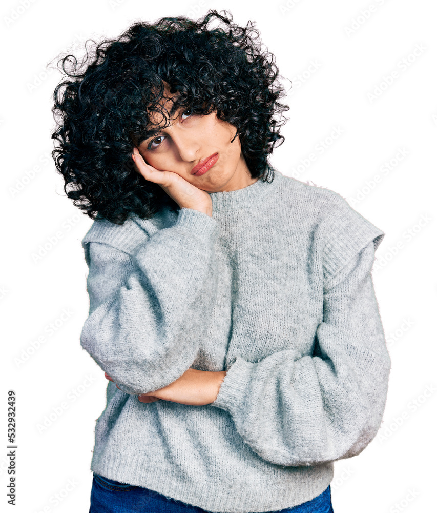 Young middle east girl wearing casual clothes thinking looking tired and bored with depression problems with crossed arms. Young middle east girl wearing casual clothes thinking looking tired and bored with depression problems with crossed arms.