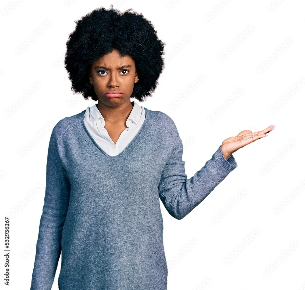 Young african american woman presenting with open palm skeptic and nervous, frowning upset because of problem. negative person. Young african american woman presenting with open palm skeptic and nervous, frowning upset because of problem. negative person.