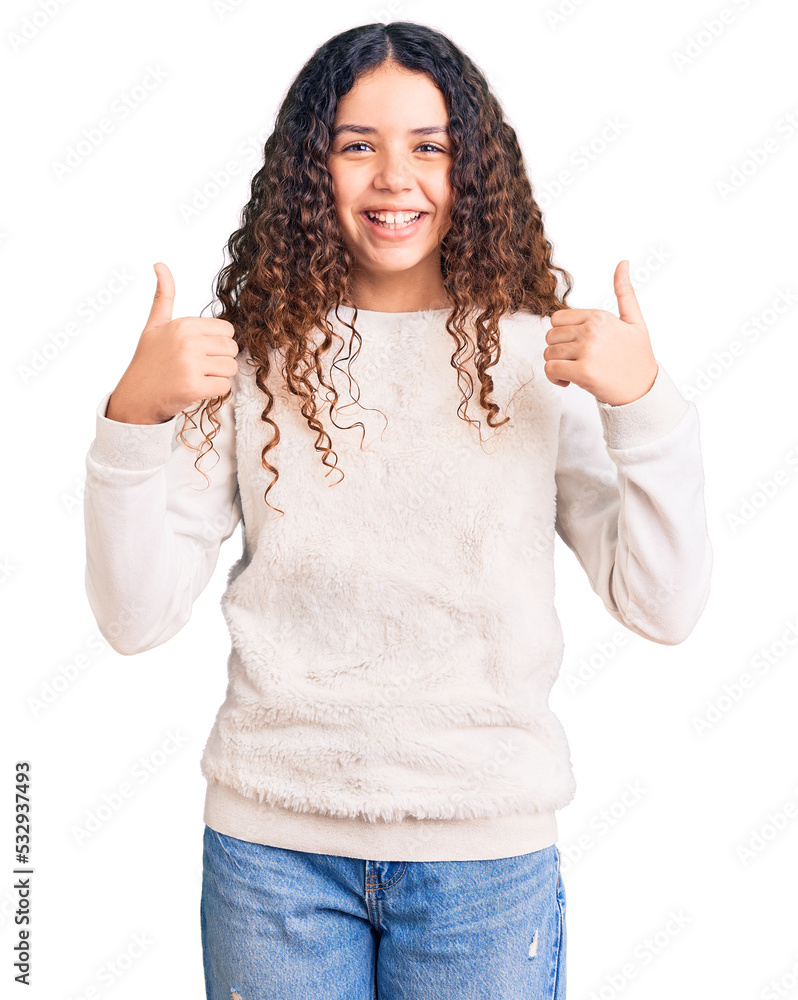 Beautiful kid girl with curly hair wearing casual clothes success sign doing positive gesture with hand, thumbs up smiling and happy. cheerful expression and winner gesture. Beautiful kid girl with curly hair wearing casual clothes success sign doing positive gesture with hand, thumbs up smiling and happy. cheerful expression and winner gesture.
