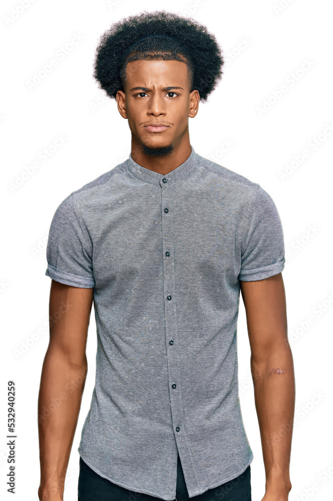 African american man with afro hair wearing casual clothes skeptic and nervous, frowning upset because of problem. negative person. African american man with afro hair wearing casual clothes skeptic and nervous, frowning upset because of problem. negative person.