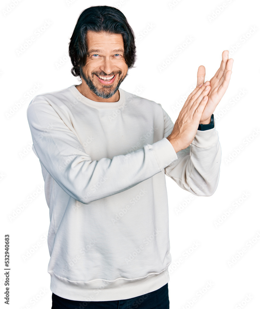 Middle age caucasian man wearing casual clothes clapping and applauding happy and joyful, smiling proud hands together Middle age caucasian man wearing casual clothes clapping and applauding happy and joyful, smiling proud hands together