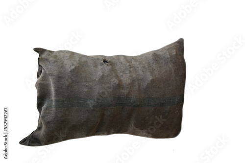 Old and dirty sack that contains coals inside, isolated on white background. Concept : natural  materials that use to be container and can decompose naturally for environment.       