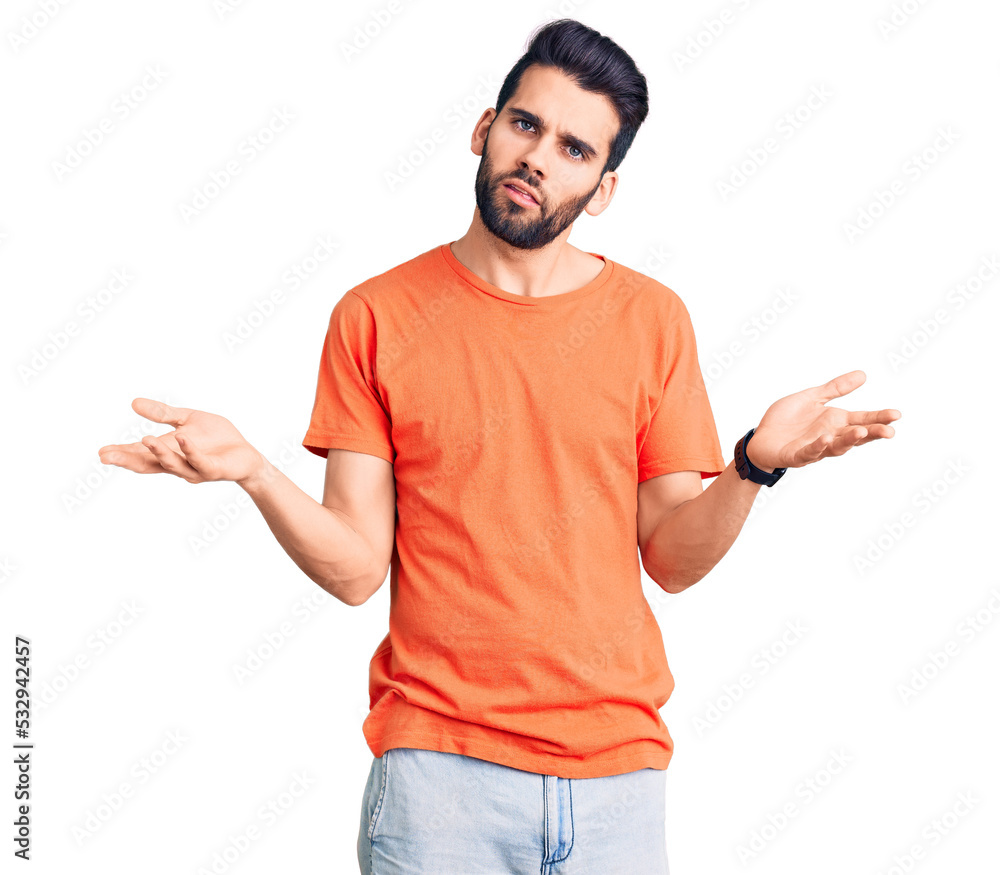 Young handsome man with beard wearing casual t-shirt clueless and confused with open arms, no idea concept. Young handsome man with beard wearing casual t-shirt clueless and confused with open arms, no idea concept.