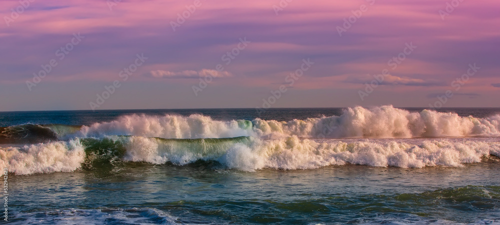 Big beautiful waves in the ocean at sunset Big beautiful waves in the ocean at sunset