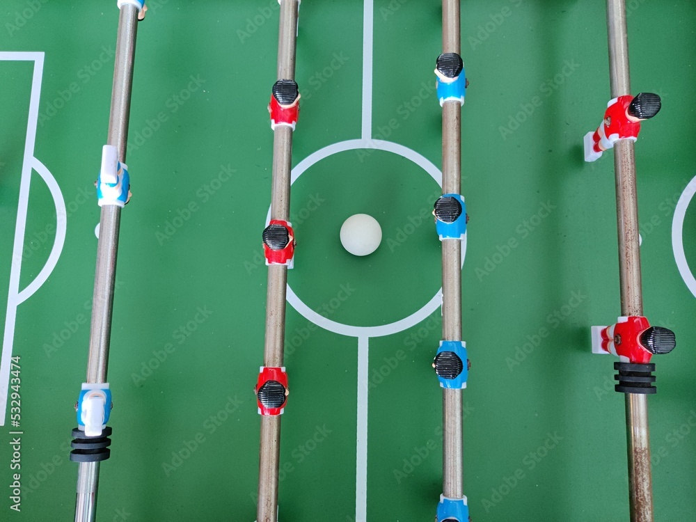 Arcade table soccer with tools for playing for office and home games. Arcade table soccer with tools for playing for office and home games.