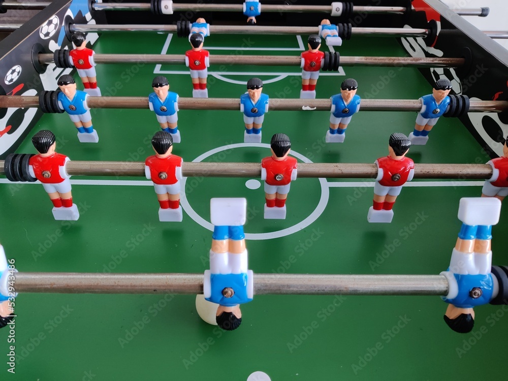 Fototapeta premium Arcade table soccer with tools for playing for office and home games.