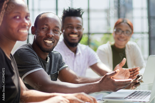 Fotografie african businessman with group of businesspeople