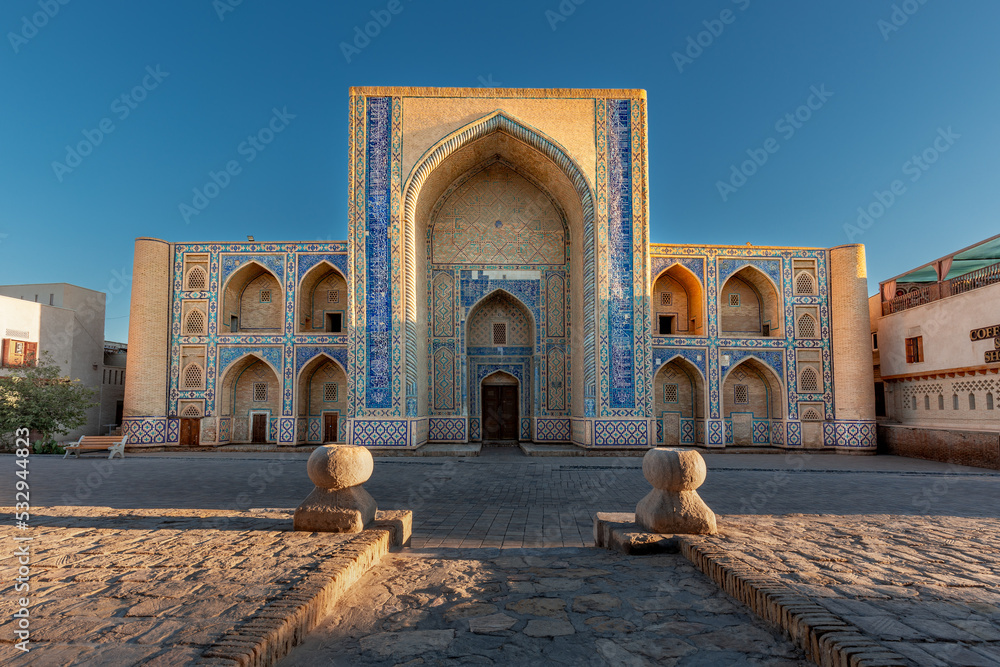 Ancient heritage Abdulaziz Madrasah colorful facade in historical centre Bukhara Uzbekistan