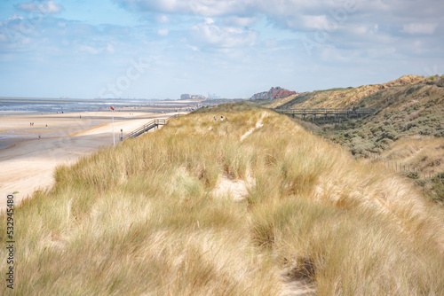 landscape dunes  with sky and clouds and beach