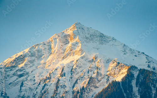 View of Spiez ,  Mountain Niesen , Spiez harbour . Beautiful city near  Lake Thun during autumn ,  winter morning  : Spiez , Switzerland : December 4 , 2019 photo