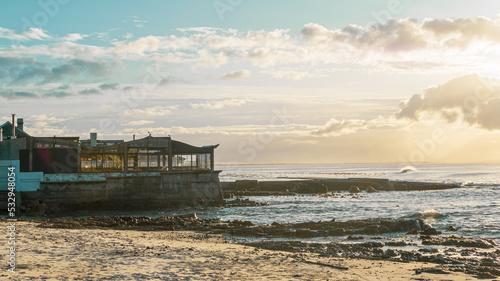 House on the beach at sunrise © Shane