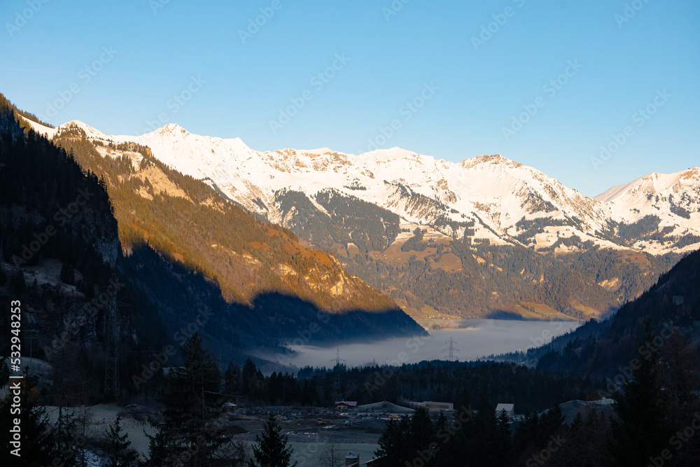 Kandersteg , resort town , village  in the Bernese Oberland  near Lake Oeschinen and Blausee during autumn , winter morning : Kandersteg , Switzerland : December 4 , 2019