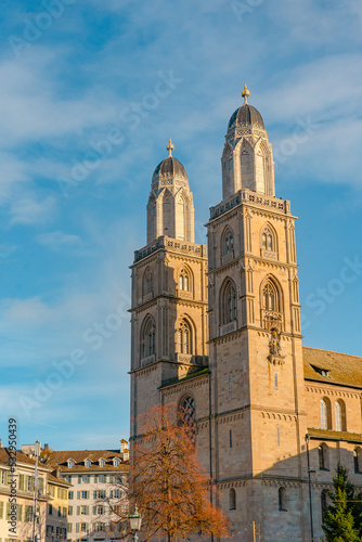 Grossmunster , Romanesque style Protestant church from Munster Bridge and Limmat river during autumn , winter : Zurich , Switzerland : December 6 , 2019