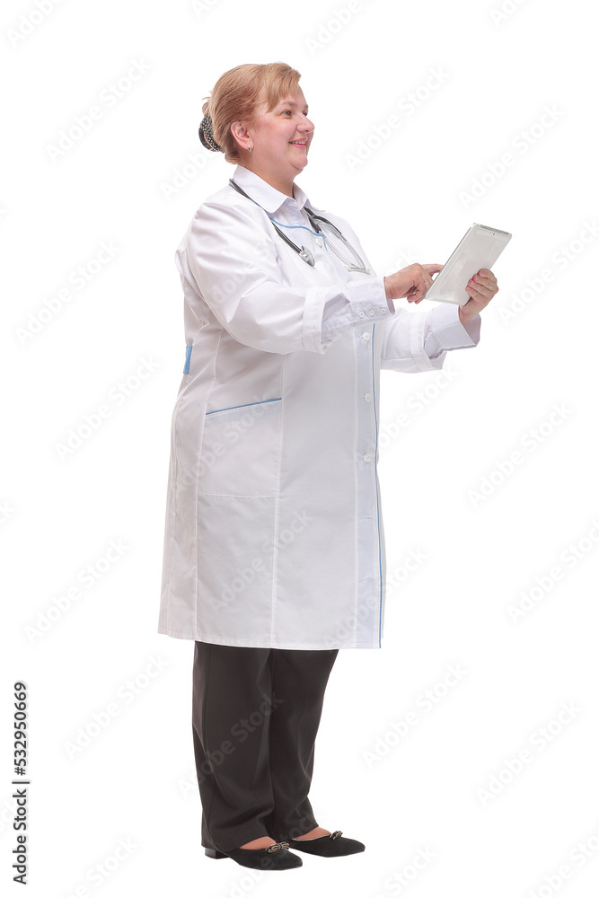 Side view of a middle age smiling doctor using a tablet computer Side view of a middle age smiling doctor using a tablet computer